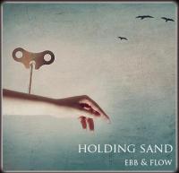 Holding_sand.jpg Holding_sand.jpg